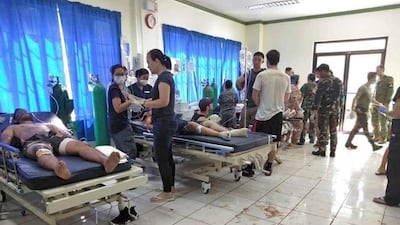 Bomb victims receive treatment in a hospital after two bombs exploded outside a Roman Catholic cathedral in Jolo, the capital of Sulu province in southern Philippines. AP