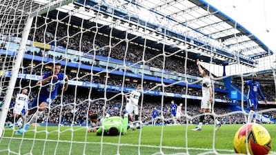 Chelsea's Spanish defender Cesar Azpilicueta, second left, turns to celebrate after scoring his team's first goal. AFP