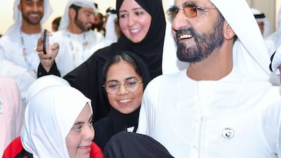 Sheikh Mohammed bin Rashid with the UAE athletes.