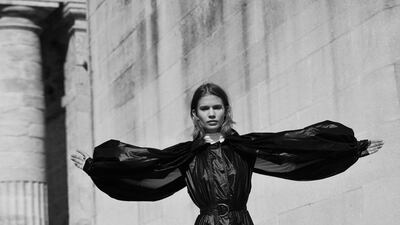 Coat, Dh8,150; and boots, Dh9,809, both from Givenchy