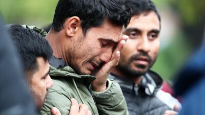 Friends and family of the victims wait near the hospital for news on March 17, 2019 in Christchurch, New Zealand. Getty Images