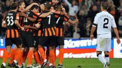 Players of FC Shakhtar celebrate after their victory over FK Partizan during their Group J, UEFA Europa League football match in Donetsk on October 1, 2009.