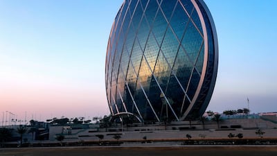 Aldar's headquarters in Abu Dhabi. Alpha Dhabi Holding acquired a 12.21 per cent stake in Aldar Properties. Victor Besa / The National