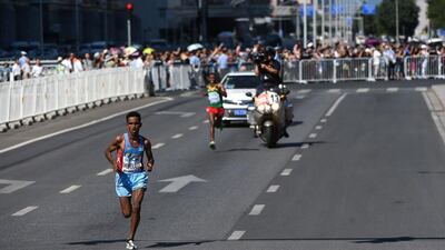 Eritrea’s Ghirmay Ghebreslassie shown running during his victory in the men’s marathon on Saturday at the 2015 World Championships in Athletics in Beijing. Greg Baker / AFP