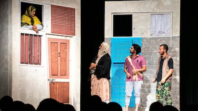 A scene from Ala Hurkruk wherein characters discuss fake news. Courtesy Adenum production