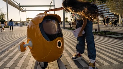 A visitor interacts with Opti the robot at the Mobility District at Expo 2020 Dubai. Robotics is one of the many degree programmes from which experts say graduates could land a high-paying job. Photo: Expo 2020 Dubai