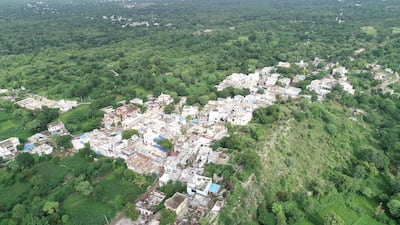 Villagers plant trees to celebrate the birth of baby girls in Piplantri village in the desert state of Rajasthan. Prem Shankar