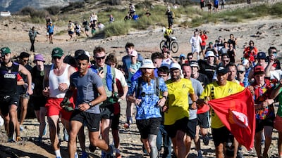 Cook runs near Cape Angela. AFP