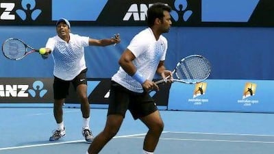Mahesh Bhupath, left, playing with Leander Paes.