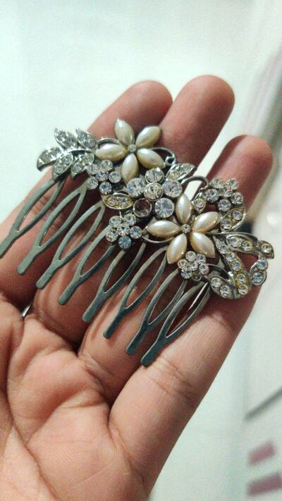 Decluttering can help you unearth lost or forgotten treasures, such as this writer's silver and pearl comb. Sonali Kokra for The National