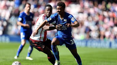 Sunderland’s Lamine Kone (L) challenges Leicester City’s Demarai Gray during the Premier League match between Sunderland and Leicester City at the Stadium of Light in Sunderland, Britain, 10 April 2016. EPA/NIGEL RODDIS