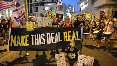 Protesters take part in a demonstration calling to end the continuing Israel-Gaza conflict in Tel Aviv. EPA