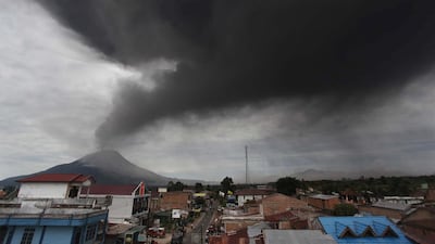Thousands of villagers fled after Mount Sinabung's series of volcanic eruptions on Indonesia's Sumatra island, spewing rocks and red-hot ash onto surrounding villages, Ade Sinuhaji /AFP Photo