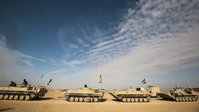 Armoured personnel carriers of the Iraqi forces and the Popular Mobilisation Forces during their advance through Anbar province. AFP