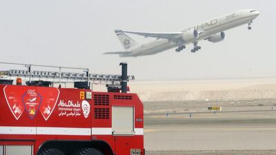 An Etihad Airways aircraft takes off from Abu Dhabi International Airport. Ben Job / Reuters
