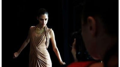 Samantha Harris is the first Aboriginal model to grace the cover of Australian Vogue in 17 years, though the magazine's editor said it was her looks, not her heritage, that led to the shoot.