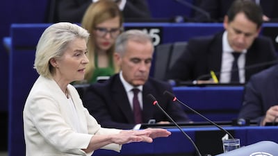 Ursula von der Leyen, European Commission President, delivers her State of the Union speech in Strasbourg, with Mark Carney, Canada's Prime Minister, listening in the background. EPA