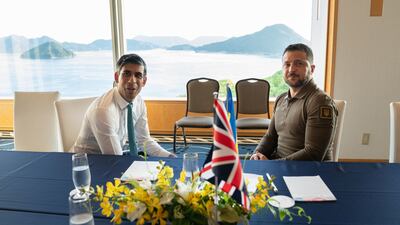 British Prime Minister Rishi Sunak, left, and Ukraine's President Volodymyr Zelenskyy at the G7 Summit in Hiroshima. AFP
