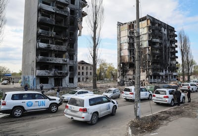 UN Secretary General Antonio Guterres's convoy passes gutted buildings in Borodyanka, near Kyiv. Reuters