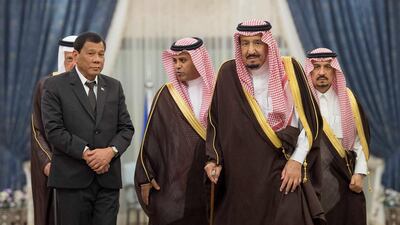 Saudi Arabia's King Salman welcomes Philippine president Rodrigo Duterte during a reception ceremony in Riyadh on April 11, 2017. Bandar Algaloud / Courtesy of Saudi Royal Court / Handout via Reuters