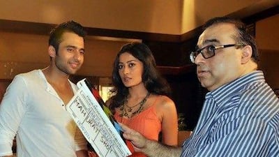 Jackky Bhagnani, left, Nidhi Subbaiah, centre, with Raj Kumar Santoshi, the director of Ajab Gazabb Love. AFP PHOT