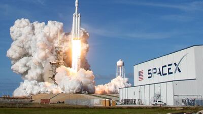 A SpaceX Falcon Heavy rocket lifts off. The company looks set to get approval for space-based broadband network. Thom Baur/Reuters