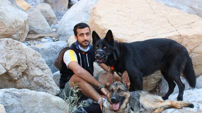Campaigner Hussain Darwish is determined to change the lives of humans and dogs with his mountain walkies. Courtesy Hussain Darwish