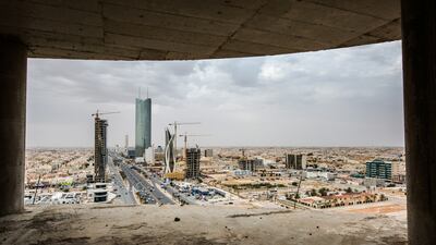 Above, construction activity in Riyadh. Payments owed by the government are being made to contractors, although slow in coming through. Waseem Obaidi for The National