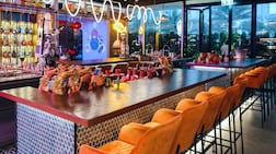 The restaurant offers counter and booth seating, as well as standing tables on the enclosed, air-conditioned terrace. Photo: Salmon Guru