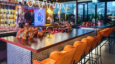 The restaurant offers counter and booth seating, as well as standing tables on the enclosed, air-conditioned terrace. Photo: Salmon Guru