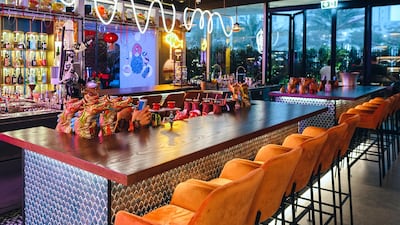 The restaurant offers counter and booth seating, as well as standing tables on the enclosed, air-conditioned terrace. Photo: Salmon Guru
