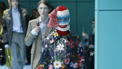 Balaclava and coat at Gucci