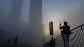 A resident takes a picture of dense fog which engulfed Dubai on Saturday morning. All photos: Antonie Robertson / The National