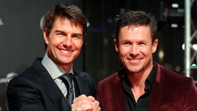 US actor Tom Cruise poses with Mr Baumgartner in Vienna in 2013. Reuters