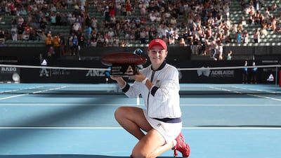 Ashleigh Barty poses with the Adelaide International trophy after beating Dayana Yastremska in the final. Getty Images