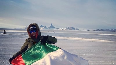 The cross-continent expedition started in Antarctica, where Khawla Al Romaithi flew the UAE flag. Images courtesy Guinness World Records