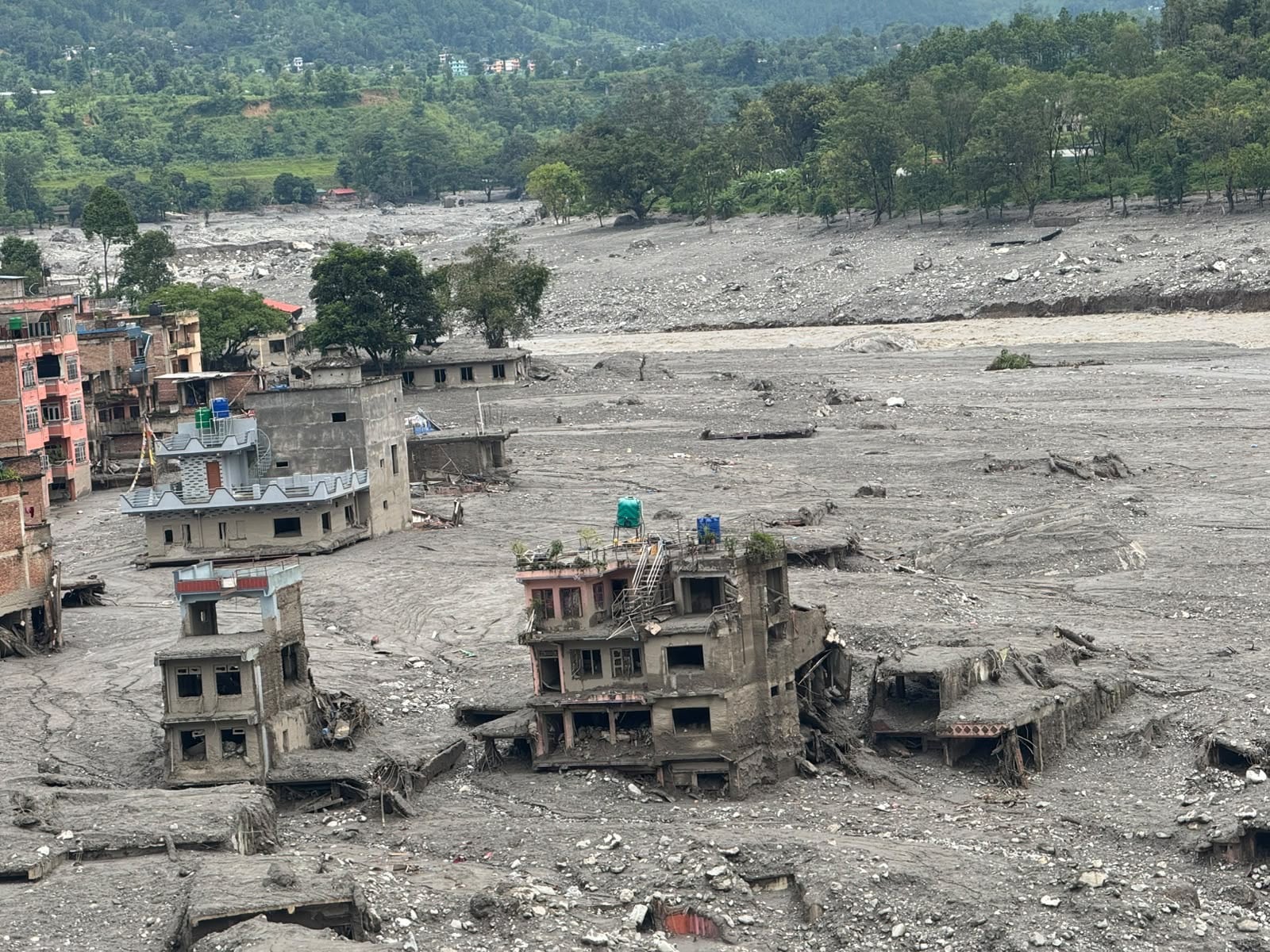 The force of the flash floods swept away the school buildings and surrounding homes. Photo: Rajendra Dawadi