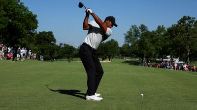 Tiger Woods plays his shot from the 16th tee during a practice round prior to the start of the 2022 PGA Championship. AFP