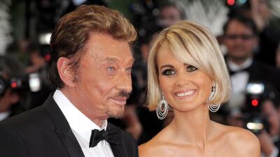 epa06370485 (FILE) A file picture dated 17 May 2009 shows French singer Johnny Hallyday (L) with his wife Laetitia arriving for the premiere of 'Vengeance' during the 62nd annual Cannes film festival in Cannes, France (reissued 06 December 2017). According to reports on 06 December 2017, French singer and actor Johnny Hallyday died at the age of 74.