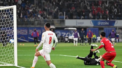 Oman's Mohammed Al Maslami scores an own goal against Bahrain in the Arabian Gulf Cup final in Kuwait. AFP