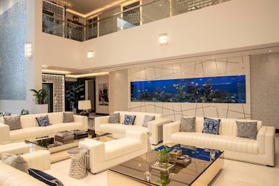 A nine-metre long aquarium runs along the seating area, which Adel refers to as the ‘celebrity wall’. “All our celebrity guests like to take their pictures here,” he says. Antonie Robertson/The National