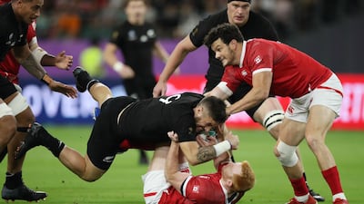 New Zealand's TJ Perenara in action with Canada's Peter Nelson New Zealand v Canada - Oita Stadium, Oita, Japan. REUTERS
