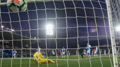 Henrique Casemiro of Real Madrid beats Leganes keeper Ivan Cuellar to score his team's second goal. Denis Doyle/Getty Images