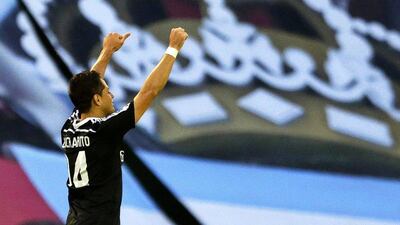 Real Madrid's Javier Hernandez celebrates scoring one of his two goals in a La Liga win over Celta Vigo on Sunday. Lavandeira Jr / EPA / April 26, 2015
