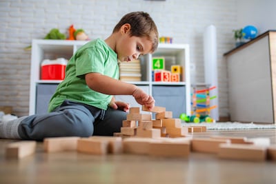 Real-life activities are the building blocks to healthy development, analogue parents believe. Getty Images