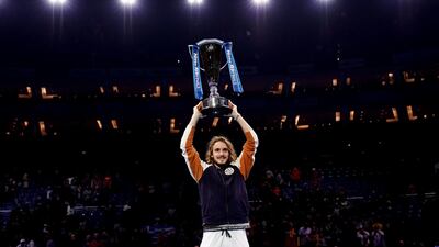 Stefanos Tsitsipas celebrates with the trophy after winning against Dominic Thiem on day eight of the Nitto ATP Finals at The O2 Arena, London. John Walton/PA Wire.