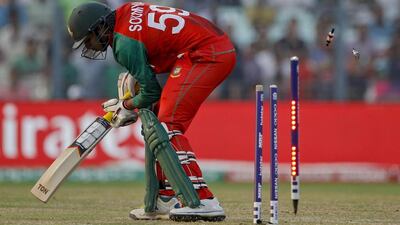 Bangladesh's Soumya Sarkar is bowled by Pakistan's Mohammad Amir during their ICC World Twenty20 2016 cricket match in Kolkata, India, Wednesday, March 16, 2016. (AP Photo/ Bikas Das)