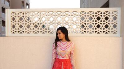 Hafsa Lodi wearing the Holly Fulton gown with floral embroidery, one of three dresses she rented as part of Designer-24's holiday offer. Courtesy Hafsa Lodi