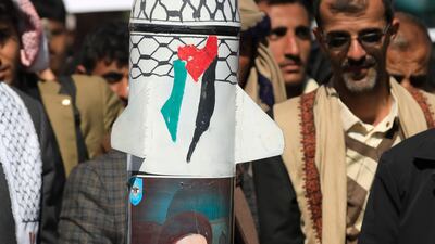A mock missile is displayed during a rally in solidarity with the Palestinian people in Sanaa. EPA