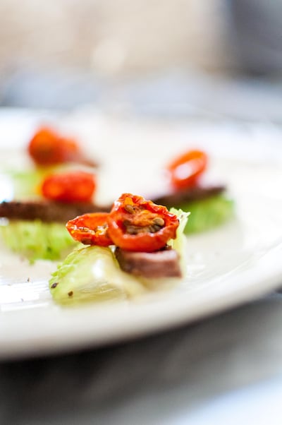 Dairy-free canape idea: Steak, caramelised onion and slow-roast tomato lettuce cups. Courtesy Scott Price